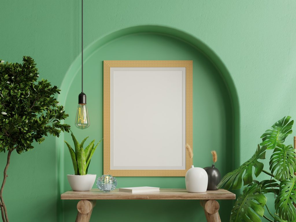 Mock up photo frame green wall.