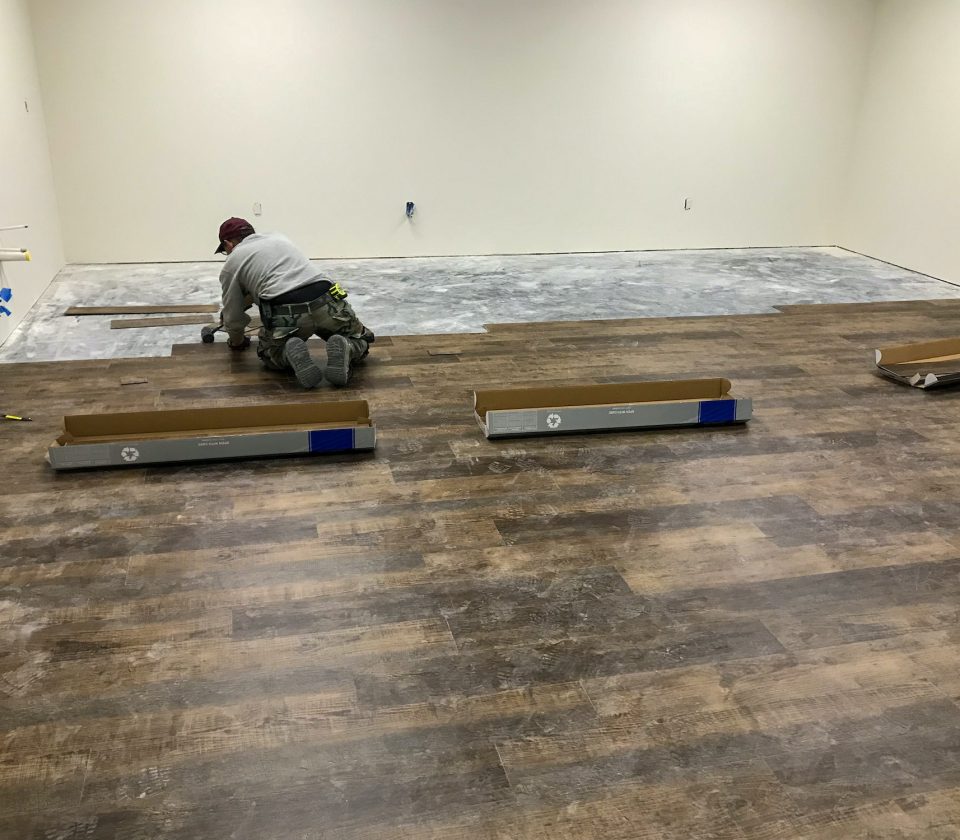 Putting down laminate flooring