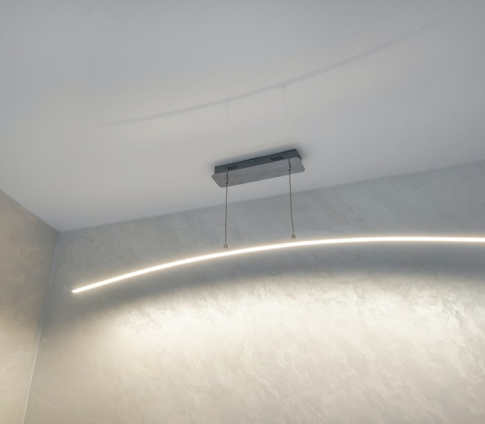 suspended ceiling with halogen spots lamps and drywall construction in empty room